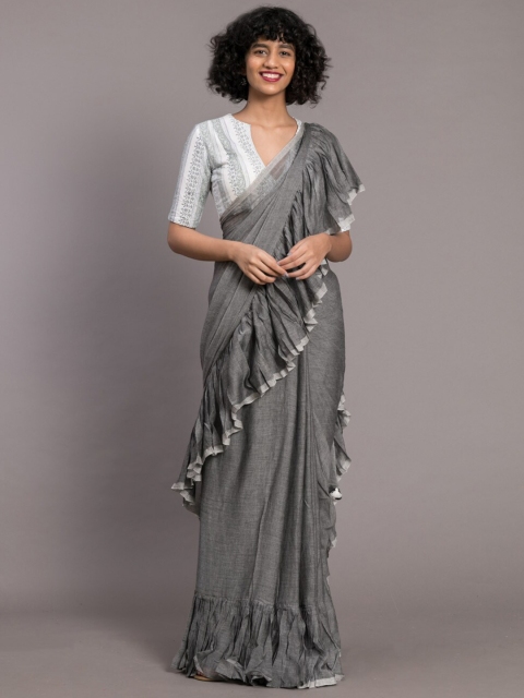 

Suta Grey & White Solid Pure Cotton Ruffle Saree