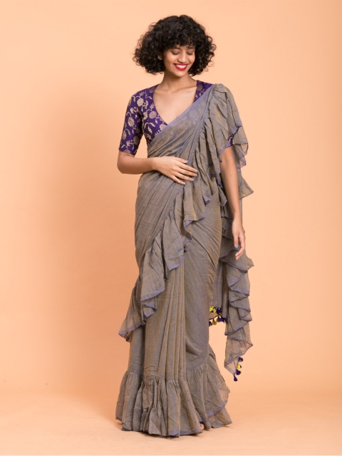 

Suta Grey Pure Cotton Solid Ruffle Saree