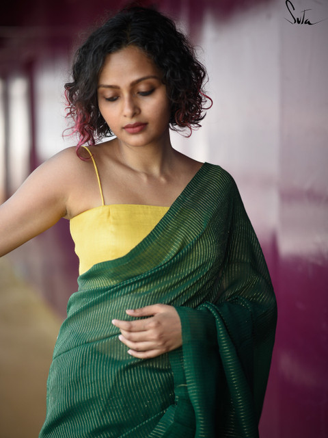

Suta Green Woven Zari Striped Pure Handloom Cotton Saree