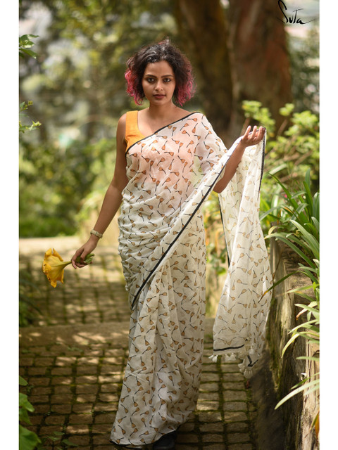 

Suta White & Yellow Floral Pure Cotton Saree