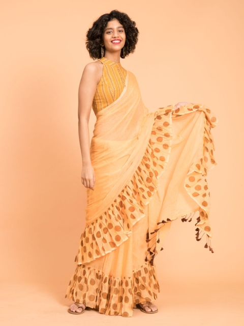 

Suta Women Orange Cotton Saree with Polka Printed Ruffle Border
