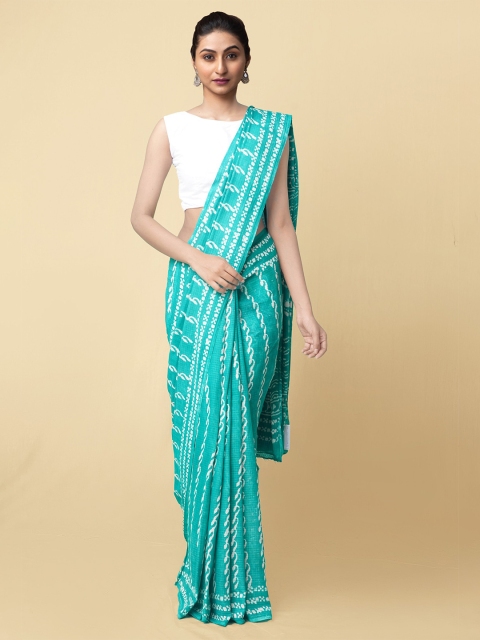 

Unnati Silks Women Turquoise Blue & White Pure Preet Dabu Mulmul Cotton Sustainable Saree