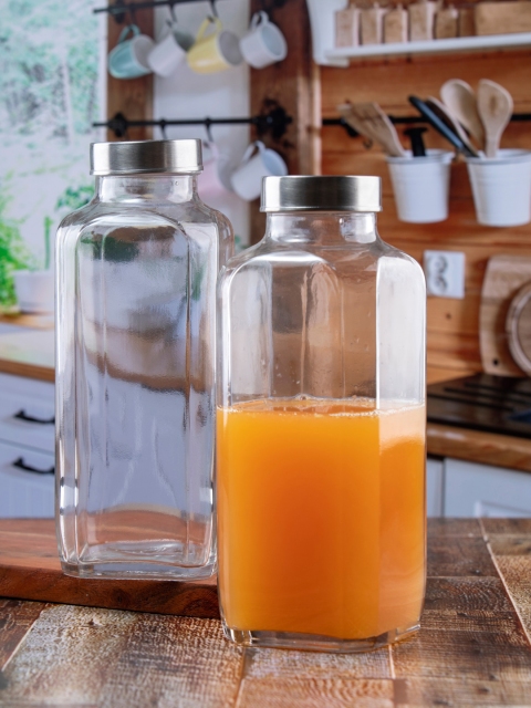 

GOODHOMES Set Of 4 Transparent Glass Water Square Bottle with Lid