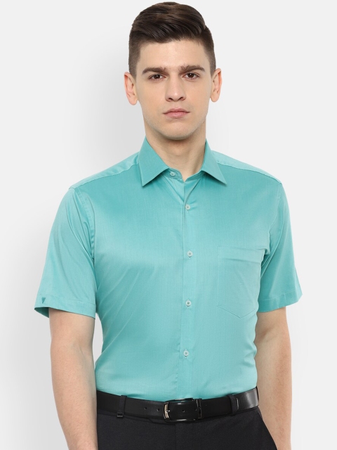 

Van Heusen Men Blue Solid Cotton Formal Shirt