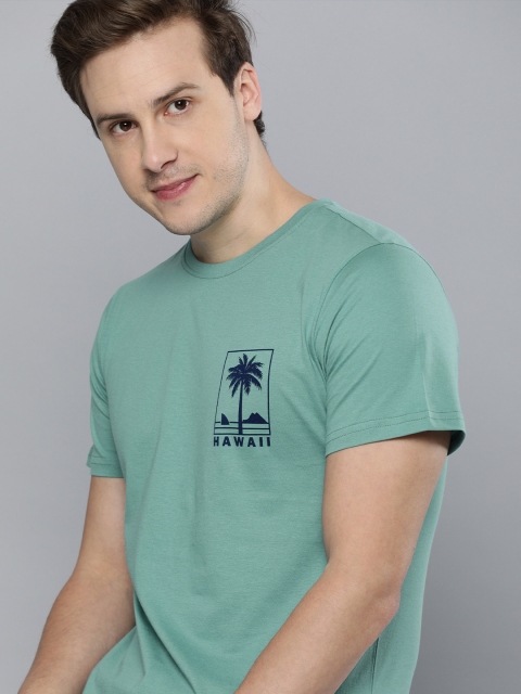 

Mast & Harbour Men Teal Blue Graphic Printed Pure Cotton Casual T-shirt