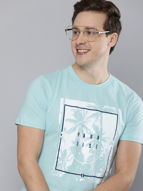 

Mast & Harbour Men Light Blue Graphic Printed Pure Cotton Casual T-shirt
