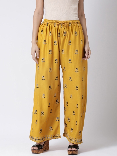 

Charitra Women Mustard Yellow & Blue Floral Printed Ethnic Palazzos