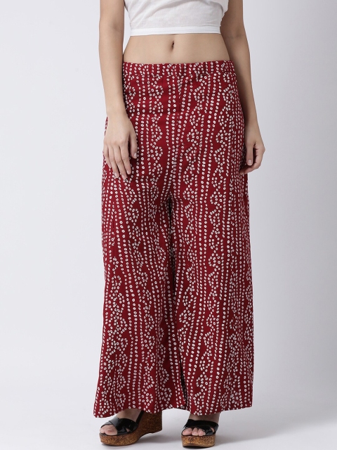 

Charitra Women Red Printed Flared Ethnic Palazzos