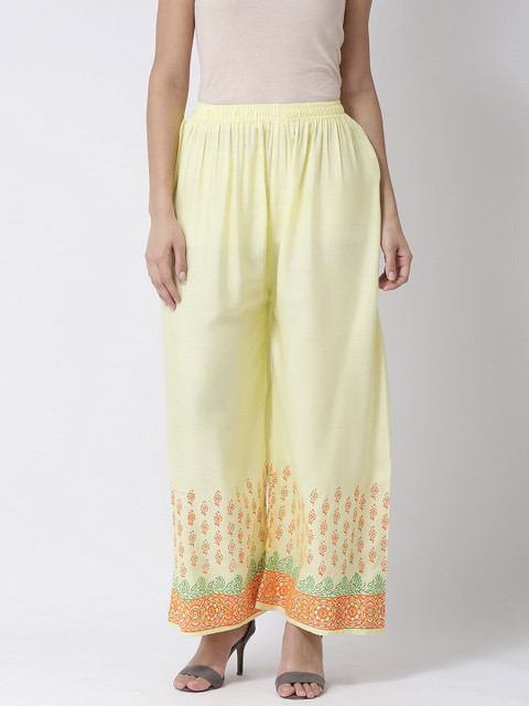 

Charitra Women Yellow & Orange Ethnic Motifs Printed Palazzos