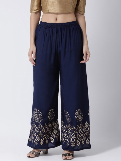 

Charitra Women Navy Blue & Gold-Toned Ethnic Motifs Printed Flared Ethnic Palazzos