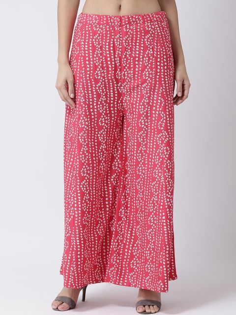 

Charitra Women Pink & White Ethnic Motifs Printed Flared Palazzos