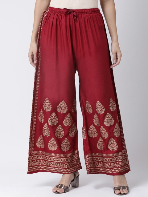

Charitra Women Maroon & Gold-Toned Ethnic Motifs Printed Flared Ethnic Palazzos