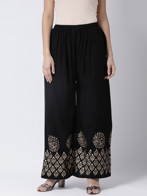 

Charitra Women Black & Gold-Toned Ethnic Motifs Printed Flared Ethnic Palazzos