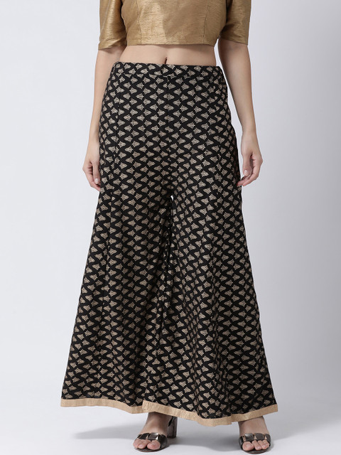 

Charitra Women Black & Gold-Toned Ethnic Motifs Printed Flared Palazzos