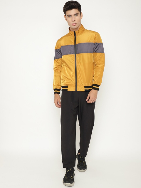 

Chkokko Men Mustard Yellow & Black Solid Tracksuit