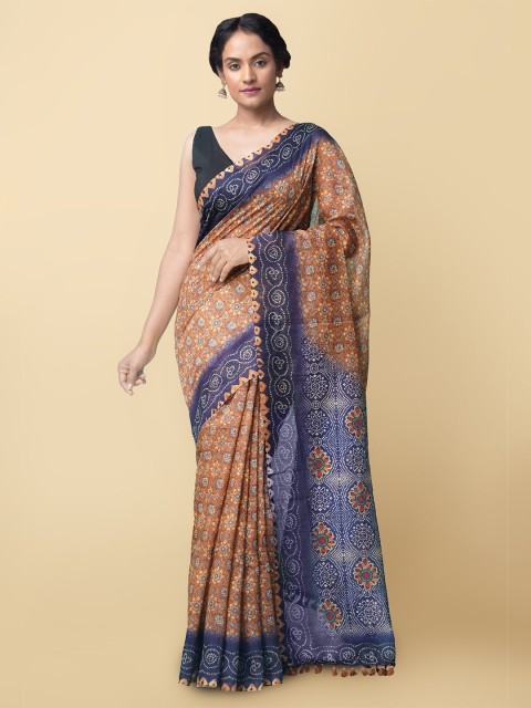 

Unnati Silks Brown & Blue Ajrak Handloom Silk Cotton Chanderi Saree