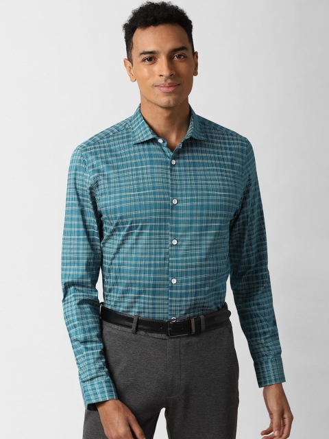 

Peter England Men Blue Checked Formal Shirt