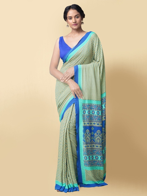 

Unnati Silks Women Beige & Blue Fancy Crepe Art Silk Saree
