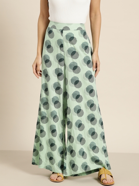 

Sangria Women Green & Black Printed Palazzos