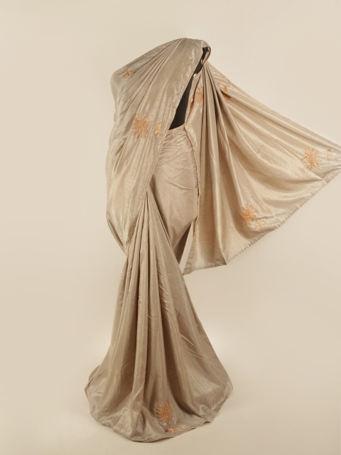 

Pothys Brown Embellished Beads and Stones Art Silk Saree