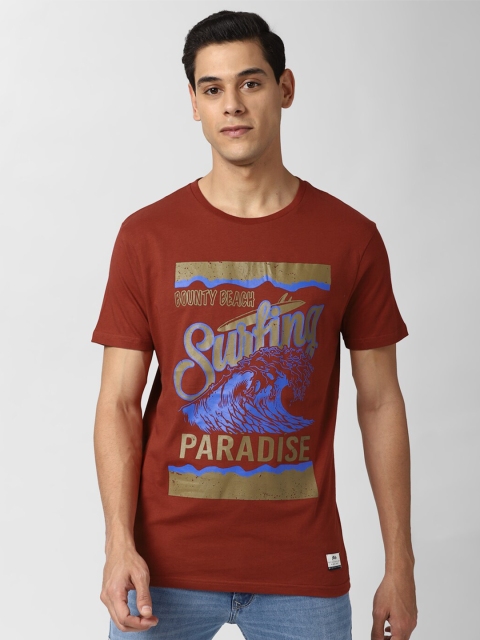 

Peter England Casuals Men Maroon Blue Typography Printed Slim Fit Cotton Pure Cotton T-shirt