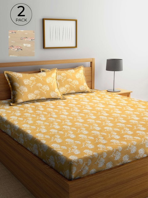 

Arrabi Yellow & Brown Floral 300 TC 2 King Bedsheet with 4 Pillow Covers