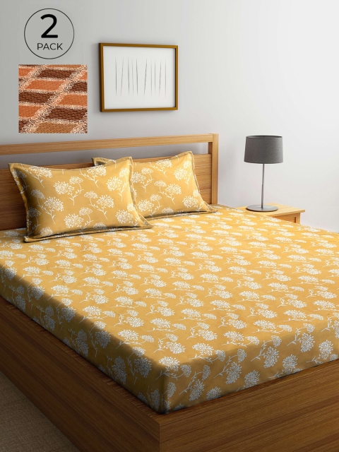 

Arrabi Yellow & Maroon Floral 300 TC 2 King Bedsheet with 4 Pillow Covers