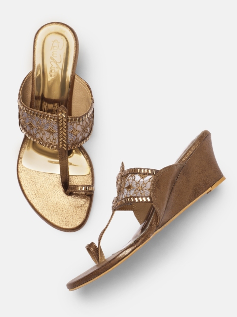 

Raw Hide Gold-Toned Wedge Sandals