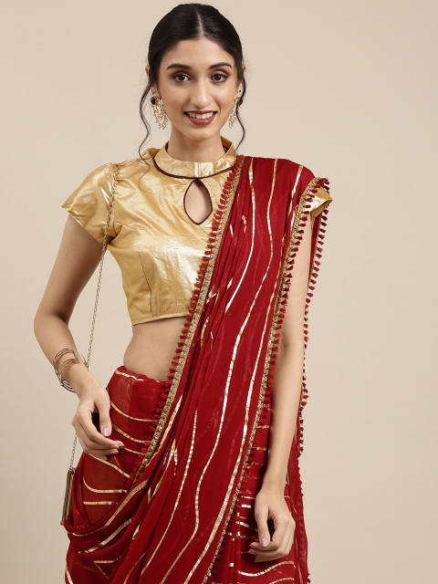 

Tikhi Imli Maroon & Gold-Toned Leheriya Zari Saree