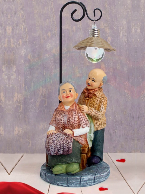 

TIED RIBBONS Blue & Green Polyresin Handcrafted Romantic Old Age Couple Showpiece