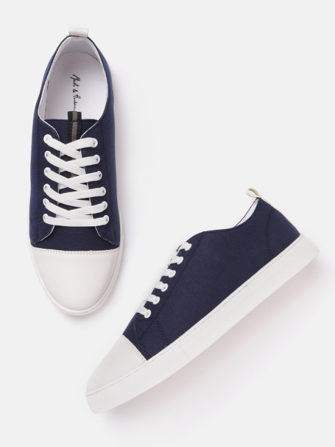 

Mast & Harbour Women Navy Blue & White Solid Contrast Sole Sneakers