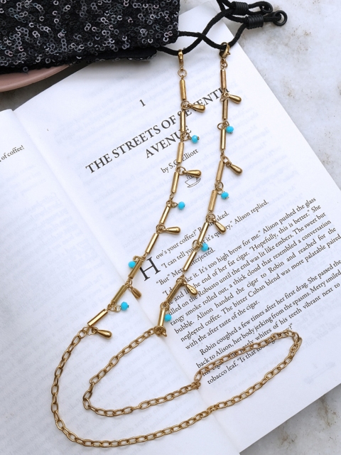 

Ayesha Woman Gold Toned Beaded Tassel Mask Chain