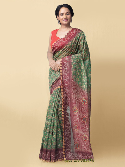 

Unnati Silks Women Green & Maroon Ajrak Printed Chanderi Silk Cotton Saree