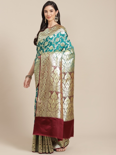 

Chhabra 555 Teal & Gold Ethnic Motifs Zari Silk Blend Kanjeevaram Saree