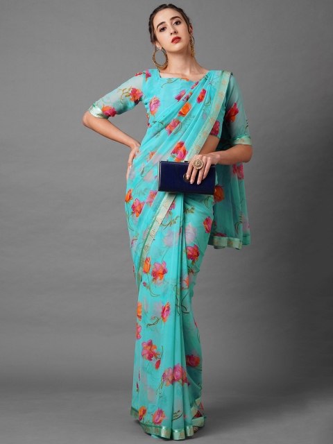 

Mitera Turquoise Blue & Fuchsia Floral Zari Saree
