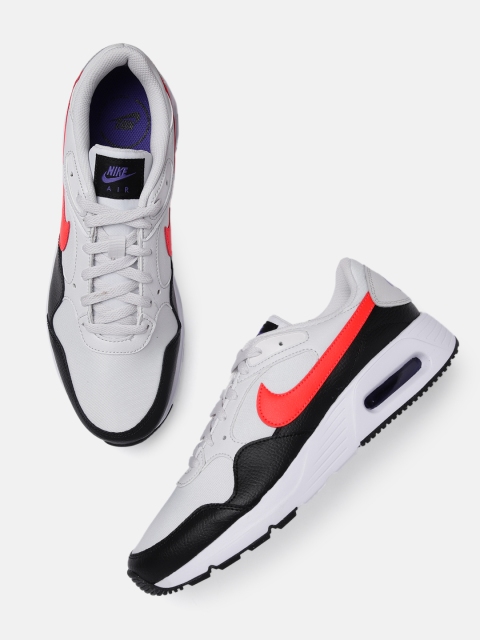 

Nike Men White & Black AIR MAX SC Striped Leather Sneakers