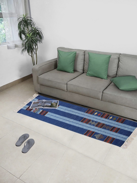 

Fabindia Blue Woven Design Wool Floor Mat