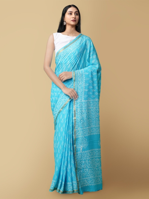 

Unnati Silks Turquoise Blue & White Floral Zari Pure Cotton Block Print Saree
