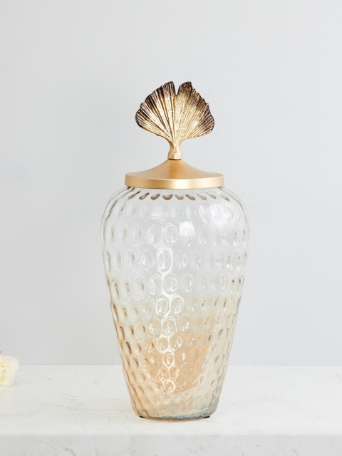 

Home Centre Gold-Toned & Transparent Textured Glass Vase With Ginko Leaf Lid
