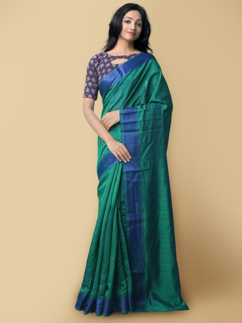 

Unnati Silks Green & Blue Art Silk Patola Saree