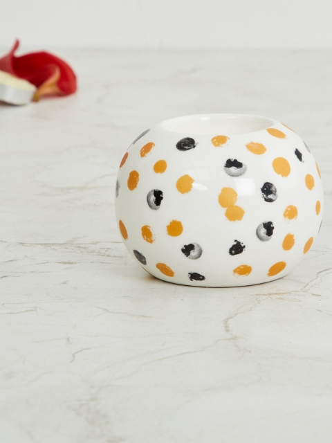 

Home Centre White & Yellow Polka Dot Printed Ceramic T-Light Holder