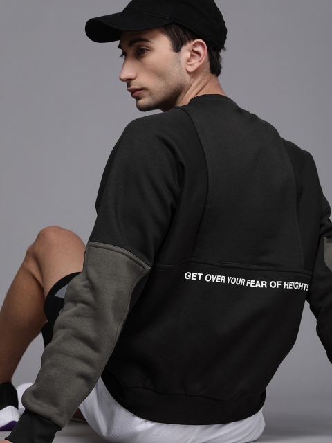 

Nike Men Black Printed Colourblocked Sleeves Sweatshirt