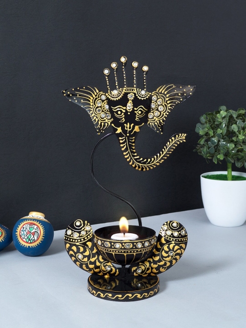 

Golden Peacock Black & Gold-Toned Ganesha Shape Tea Light Candle Holder
