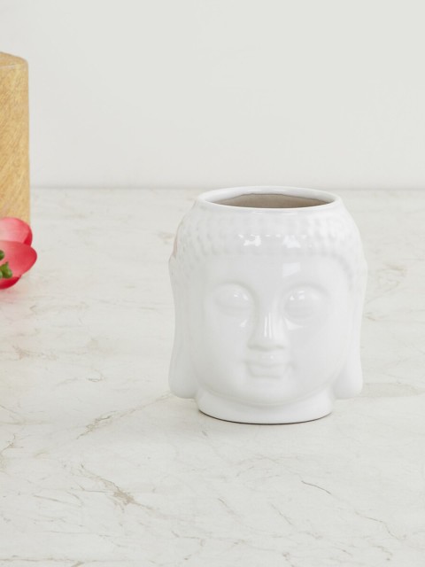 

Home Centre White Solid Face-Shaped Ceramic Planter