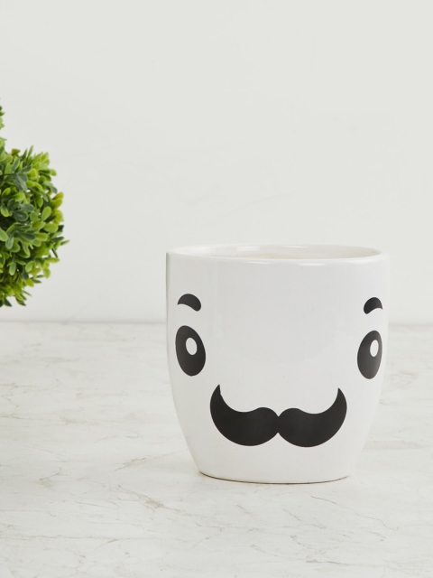 

Home Centre White & Black Printed Ceramic Planter