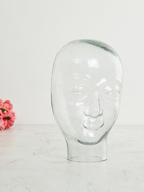

Home Centre Transparent Solid Fiesta Buddha Face Figurine Showpiece
