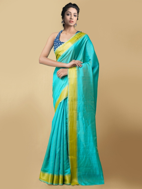 

Unnati Silks Turquoise Blue & Gold-Toned Art Silk Patola Saree