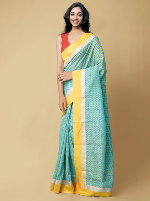 

Unnati Silks Sea Green & Yellow Floral Jute Cotton Block Print Saree