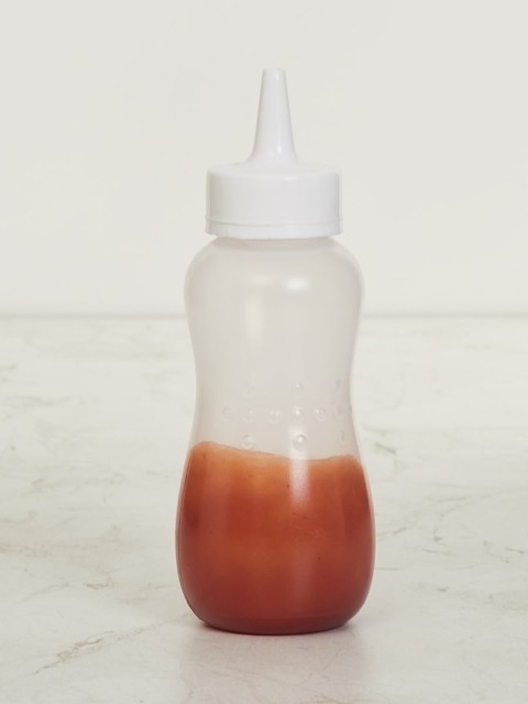 

Home Centre Transparent & White Solid Sauce Bottle