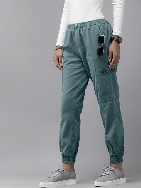 

Roadster Women Green Solid Textured Joggers Trousers